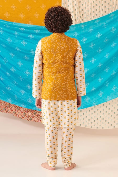 Shop Cute Couture Yellow Cotton, Muslin Embroidery Bloom Bandhani Print Bundi Kurta Set at Aza Fashions Shop_Cute Couture_Yellow Cotton, Muslin Embroidery Bloom Bandhani Print Bundi Kurta Set _at_Aza_Fashions