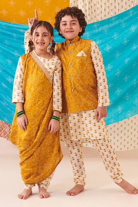 Cute Couture Yellow Cotton, Muslin Embroidery Bloom Bandhani Print Bundi Kurta Set at Aza Fashions Cute Couture_Yellow Cotton, Muslin Embroidery Bloom Bandhani Print Bundi Kurta Set _at_Aza_Fashions