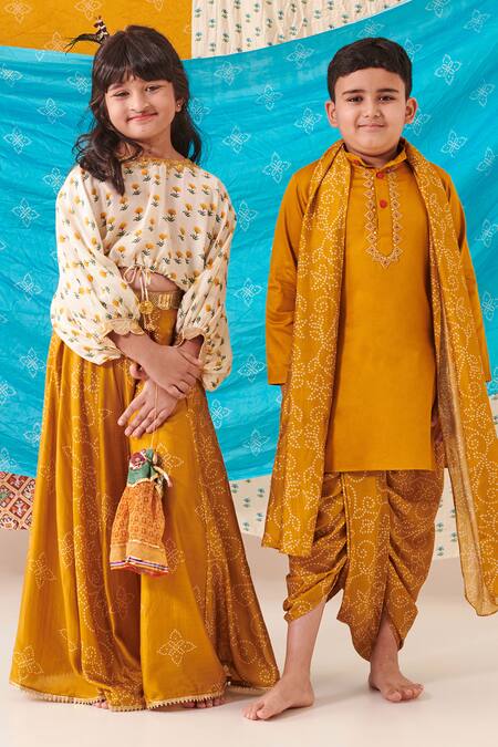 Cute Couture_Yellow Silk Lace Placket Kurta And Floral Bandhani Print Dhoti Pant Set _at_Aza_Fashions