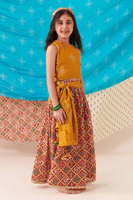 Buy Cute Couture Yellow Silk Print Phool Bloom Blossom Embroidered Top And Patola Lehenga Set Online at Aza Fashions Buy_Cute Couture_Yellow Silk Print Phool Bloom Blossom Embroidered Top And Patola Lehenga Set _Online_at_Aza_Fashions