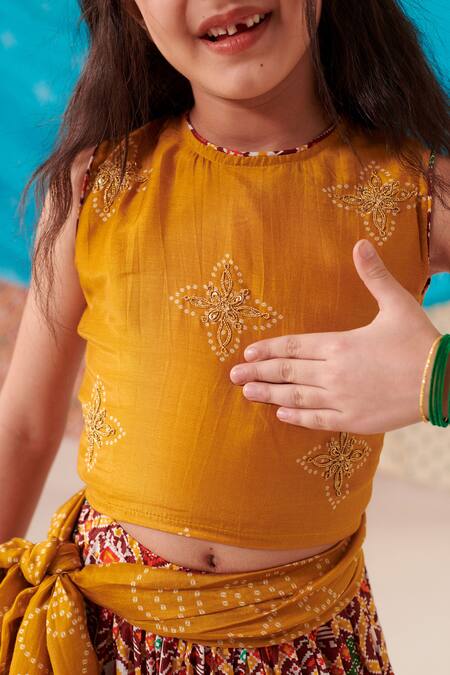 Shop Cute Couture Yellow Silk Print Phool Bloom Blossom Embroidered Top And Patola Lehenga Set Online at Aza Fashions Shop_Cute Couture_Yellow Silk Print Phool Bloom Blossom Embroidered Top And Patola Lehenga Set _Online_at_Aza_Fashions