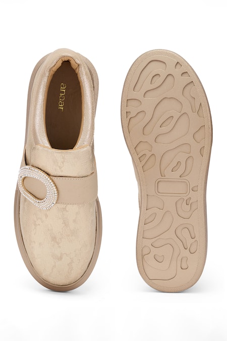 Shop Anaar Gold Maverick Embellished Metallic Sneakers at Aza Fashions Shop_Anaar_Gold Maverick Embellished Metallic Sneakers _at_Aza_Fashions