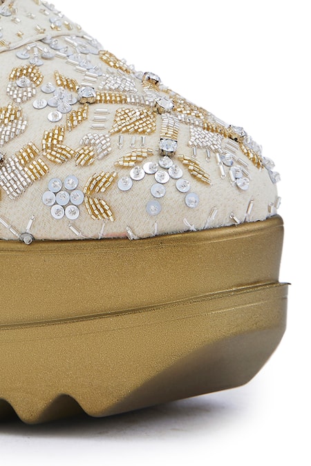 Anaar Off White Embroidery, Sequins Kaleera Drop Bead Embellished Wedge Sneakers at Aza Fashions Anaar_Off White Embroidery, Sequins Kaleera Drop Bead Embellished Wedge Sneakers _at_Aza_Fashions