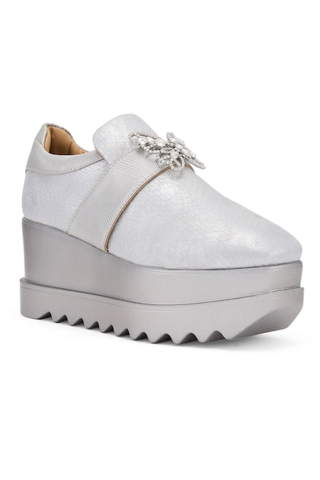 Buy Anaar Silver Brooches Sweet Sins Butterfly Buckle Wedge Sneakers Online at Aza Fashions Buy_Anaar_Silver Brooches Sweet Sins Butterfly Buckle Wedge Sneakers _Online_at_Aza_Fashions