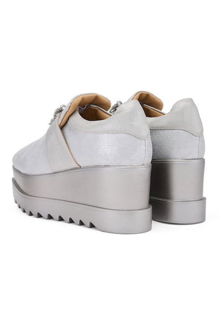 Shop Anaar Silver Brooches Sweet Sins Butterfly Buckle Wedge Sneakers Online at Aza Fashions Shop_Anaar_Silver Brooches Sweet Sins Butterfly Buckle Wedge Sneakers _Online_at_Aza_Fashions