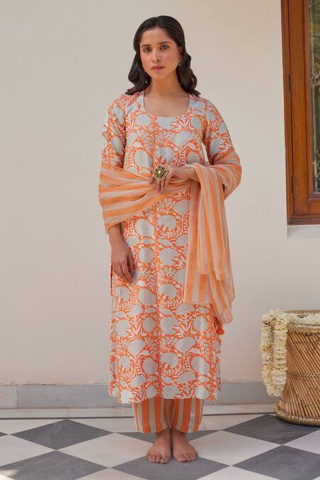 Kapraaaha_Orange Muslin Tassels Round Neck Floral Block Print Kurta Set _Online_at_Aza_Fashions