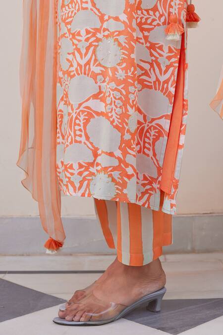 Kapraaaha_Orange Muslin Tassels Round Neck Floral Block Print Kurta Set _at_Aza_Fashions