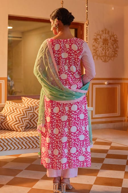Shop_Kapraaaha_Pink Muslin Tassels Round Neck Floral Block Print Kurta Pant Set _at_Aza_Fashions