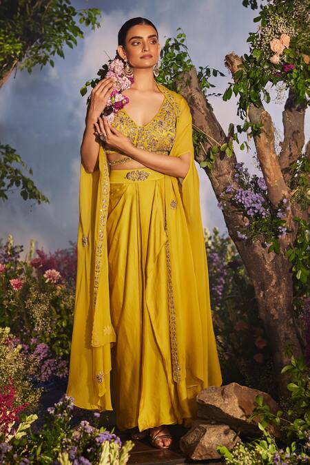 Miku Kumar Yellow Modal, Kalika Zardozi Embroidered Floral Asymmetric Cape Draped Skirt Set at Aza Fashions Miku Kumar_Yellow Modal, Kalika Zardozi Embroidered Floral Asymmetric Cape Draped Skirt Set _at_Aza_Fashions