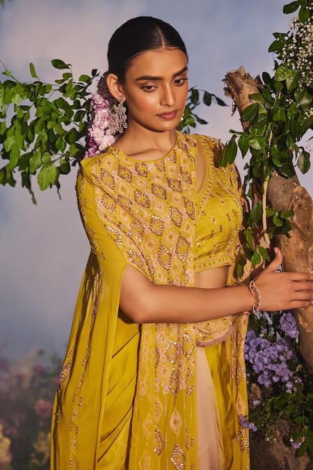 Miku Kumar Yellow Satin, Georgette Azra Geometric Embroidered Cut-out Cape Dhoti Skirt Set at Aza Fashions Miku Kumar_Yellow Satin, Georgette Azra Geometric Embroidered Cut-out Cape Dhoti Skirt Set _at_Aza_Fashions