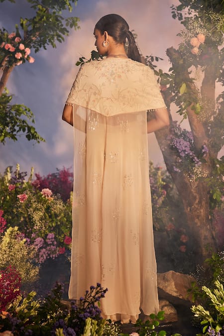 Shop Miku Kumar Peach Satin, Organza, Georgette Suhana Floral Vine Embroidered Cape Palazzo Set at Aza Fashions Shop_Miku Kumar_Peach Satin, Organza, Georgette Suhana Floral Vine Embroidered Cape Palazzo Set _at_Aza_Fashions