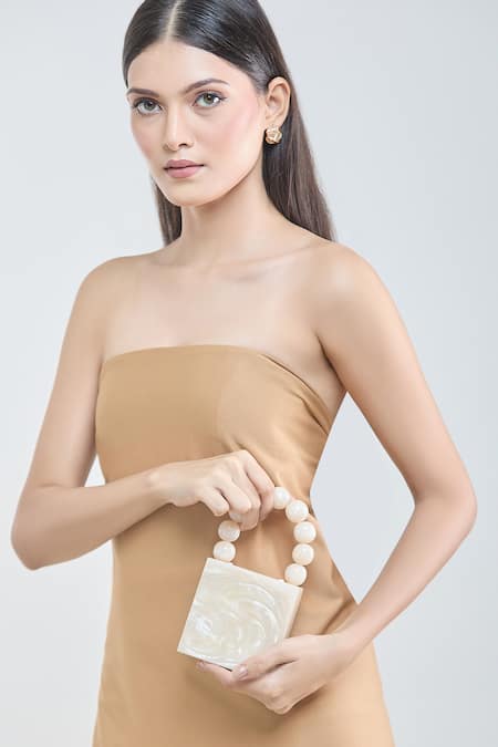 Shop Boxwish By Bhumika Ivory Pearls Handle Resin Clutch at Aza Fashions Shop_Boxwish By Bhumika_Ivory Pearls Handle Resin Clutch _at_Aza_Fashions