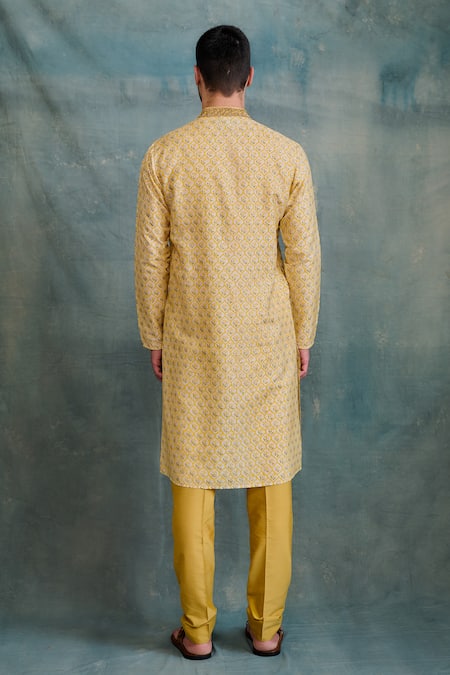 Shop Krishna Mehta Yellow Tussar Zari Jaal Print Kurta With Churidar at Aza Fashions Shop_Krishna Mehta_Yellow Tussar Zari Jaal Print Kurta With Churidar _at_Aza_Fashions