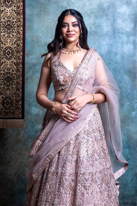 Jiya By Veer Design Studio_Gold Net Cut Work, Mirrors V-neck Floral Embroidered Bridal Lehenga Set _at_Aza_Fashions