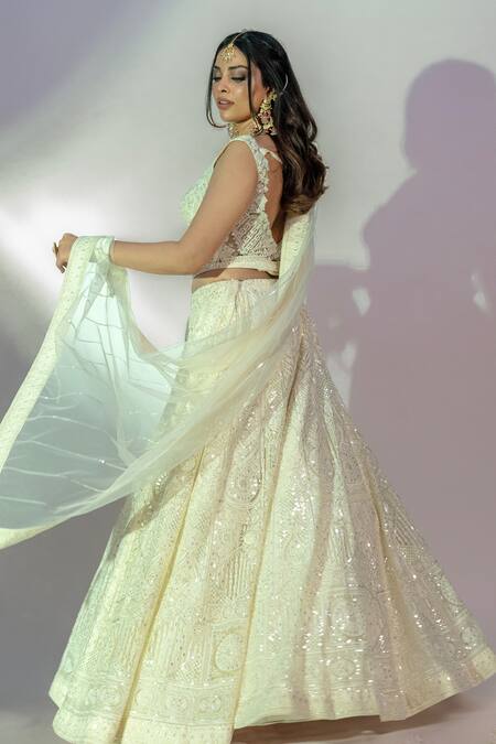 Shop_Jiya By Veer Design Studio_Ivory Net Sequins, Crystals V-neck Tonal Thread Embroidered Bridal Lehenga Set _Online_at_Aza_Fashions