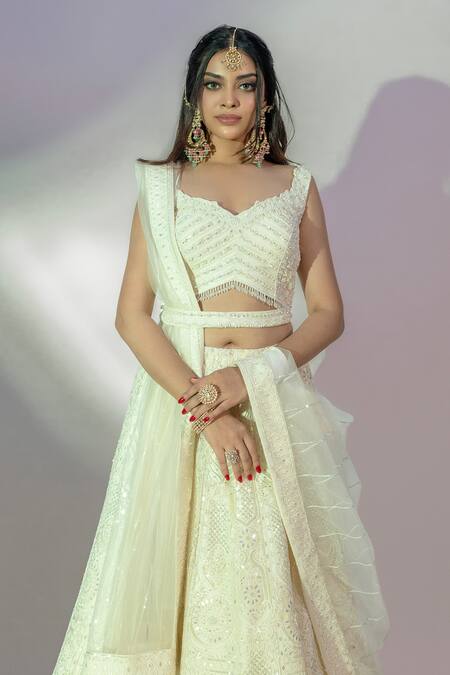 Jiya By Veer Design Studio_Ivory Net Sequins, Crystals V-neck Tonal Thread Embroidered Bridal Lehenga Set _at_Aza_Fashions