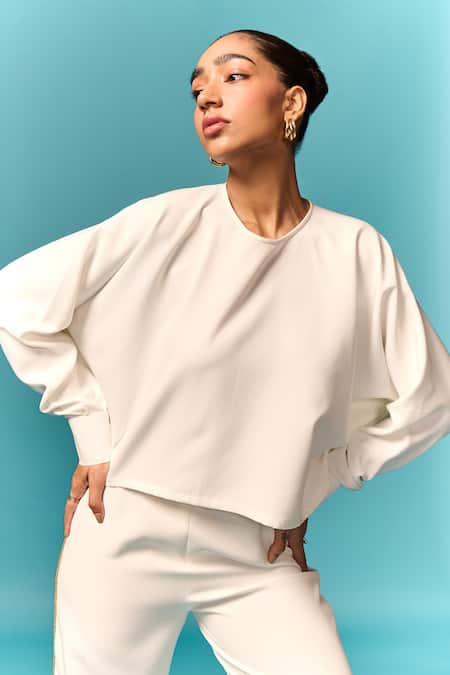 Emblaze_White Crepe Round Neck Cut Out Top And Embellished Trouser Set _at_Aza_Fashions