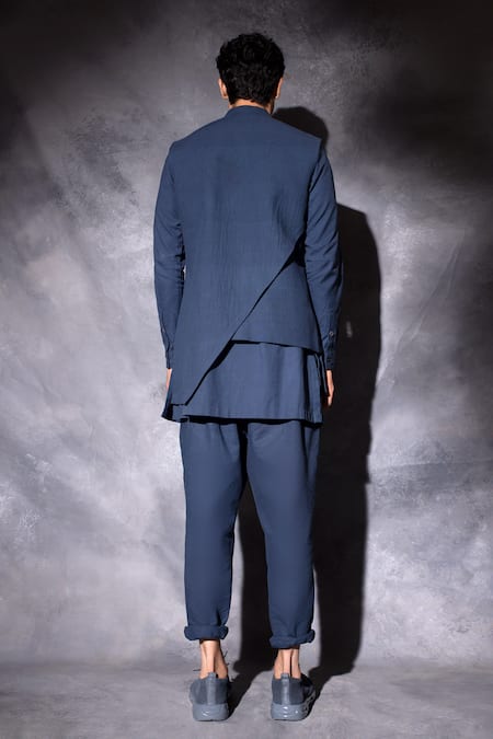 Shop Studio Error Blue Cotton Plain Layered Asymmetric Waistcoat at Aza Fashions Shop_Studio Error_Blue Cotton Plain Layered Asymmetric Waistcoat _at_Aza_Fashions