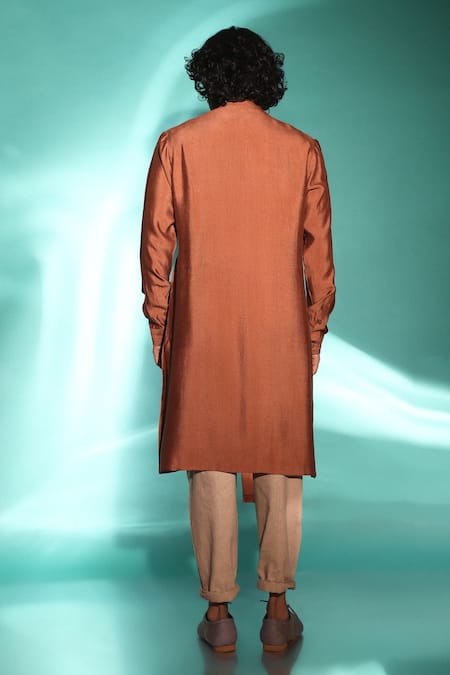 Shop Studio Error Orange Cotton, Silk Solid Cut-out Hem Kurta at Aza Fashions Shop_Studio Error_Orange Cotton, Silk Solid Cut-out Hem Kurta _at_Aza_Fashions