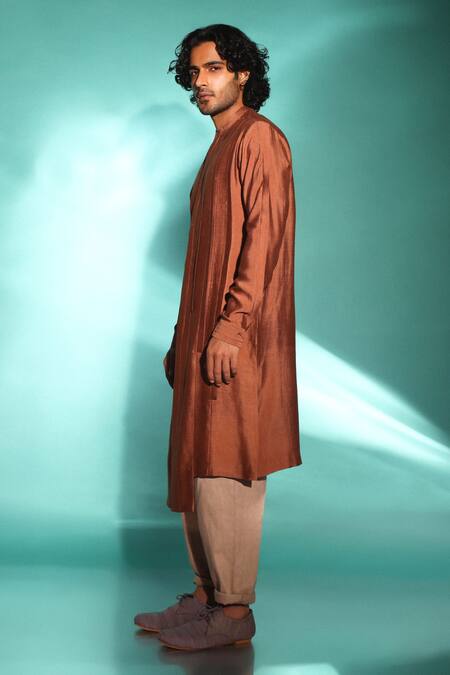 Buy Studio Error Orange Cotton, Silk Solid Cut-out Hem Kurta Online at Aza Fashions Buy_Studio Error_Orange Cotton, Silk Solid Cut-out Hem Kurta _Online_at_Aza_Fashions