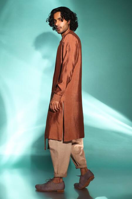 Shop Studio Error Orange Cotton, Silk Solid Cut-out Hem Kurta Online at Aza Fashions Shop_Studio Error_Orange Cotton, Silk Solid Cut-out Hem Kurta _Online_at_Aza_Fashions