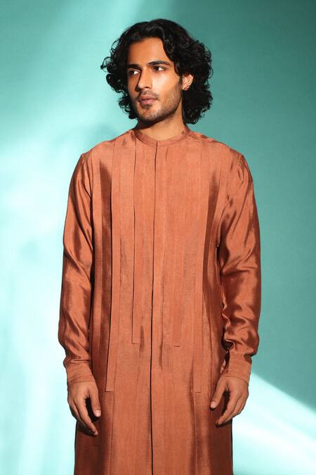 Studio Error Orange Cotton, Silk Solid Cut-out Hem Kurta at Aza Fashions Studio Error_Orange Cotton, Silk Solid Cut-out Hem Kurta _at_Aza_Fashions