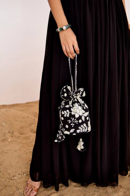Suruchi Parakh_Black Georgette Embroidery, Sequins Floral Bodice Gown With Potli Bag _at_Aza_Fashions