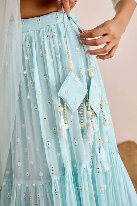 Suruchi Parakh_Blue Net, Georgette Mirrors, Beads, Sequins V-neck Work Tiered Lehenga Set _at_Aza_Fashions