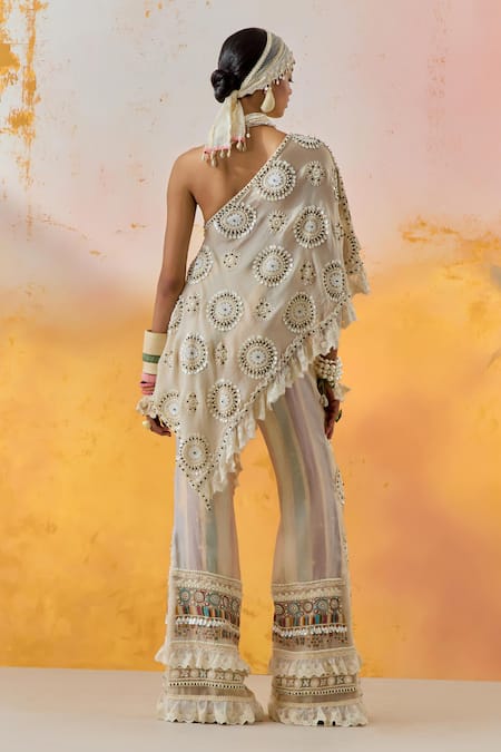 Shop Aseem Kapoor Beige Silk Sequins, Beads Asymmetric Rasa Embroidered Top With Bootleg Trouser at Aza Fashions Shop_Aseem Kapoor_Beige Silk Sequins, Beads Asymmetric Rasa Embroidered Top With Bootleg Trouser _at_Aza_Fashions