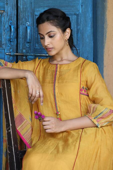 Label Kinjal Modi_Yellow Chanderi, Tissue Tassels, Mirrors, Placement Straight Kurta Pant Set _at_Aza_Fashions