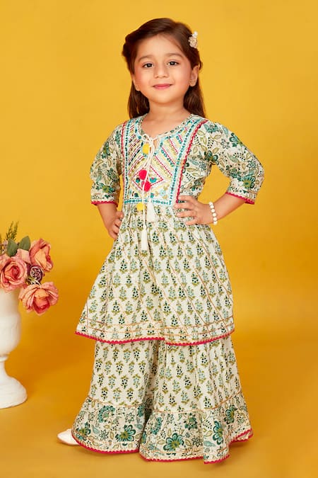Shop Maaikid White Cotton Tassels, Diamonds Floral Print Peplum Kurta With Palazzo Online at Aza Fashions Shop_Maaikid_White Cotton Tassels, Diamonds Floral Print Peplum Kurta With Palazzo _Online_at_Aza_Fashions