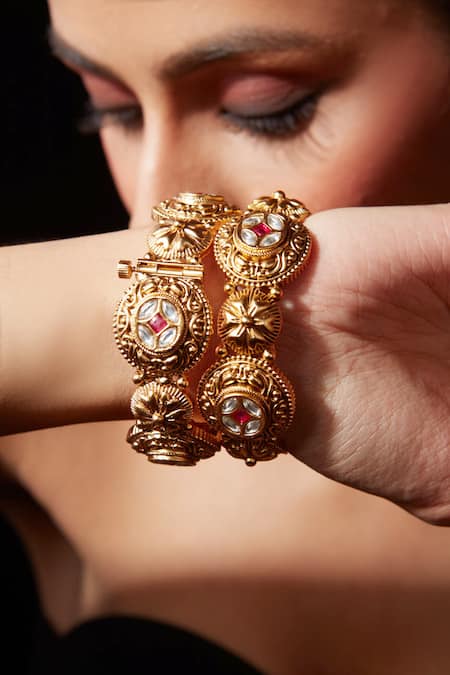 Shop_Vivinia By Vidhi Mehra_Gold Plated Crystals Kundan Studded Temple Bangle - Set Of 2 _Online_at_Aza_Fashions