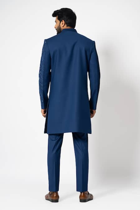 Shop Yoseba Blue Suede, Cotton, Polyester Ultramarine Cutdana Asymmetric Achkan With Pant at Aza Fashions Shop_Yoseba_Blue Suede, Cotton, Polyester Ultramarine Cutdana Asymmetric Achkan With Pant _at_Aza_Fashions