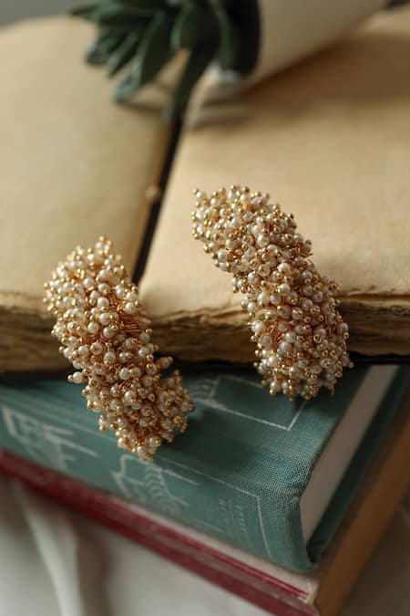 Shop Do Taara Gold Plated Pearls Tassel Embellished Half Hoops at Aza Fashions Shop_Do Taara_Gold Plated Pearls Tassel Embellished Half Hoops _at_Aza_Fashions
