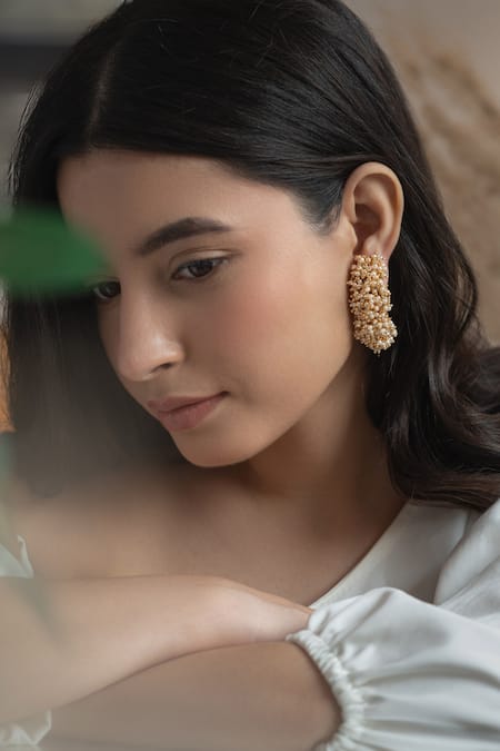 Buy Do Taara Gold Plated Pearls Tassel Embellished Half Hoops Online at Aza Fashions Buy_Do Taara_Gold Plated Pearls Tassel Embellished Half Hoops _Online_at_Aza_Fashions