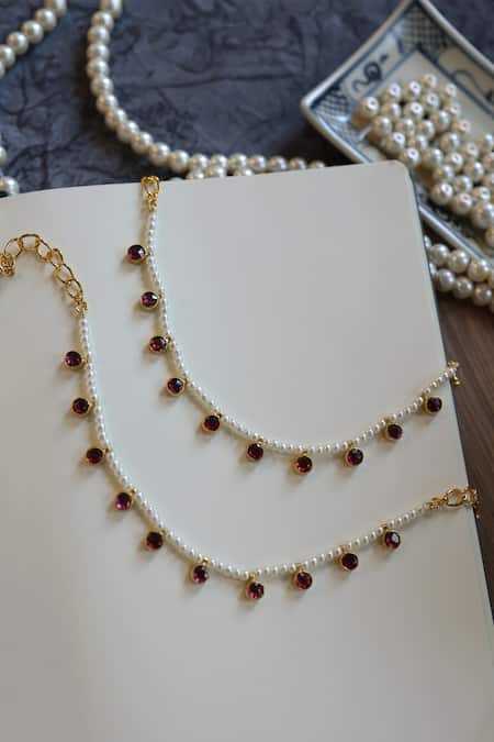 Shop Do Taara Red Pearls, Diamonds Kundan Embellished Anklets-Set of 2 at Aza Fashions Shop_Do Taara_Red Pearls, Diamonds Kundan Embellished Anklets-Set of 2 _at_Aza_Fashions