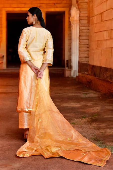 Shop Bannhi By Priyanka Rathore Yellow Denim, Silk Gota Patti V-neck Flower Kurta Pant Set at Aza Fashions Shop_Bannhi By Priyanka Rathore_Yellow Denim, Silk Gota Patti V-neck Flower Kurta Pant Set _at_Aza_Fashions