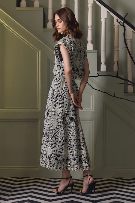 Shop Label Deepika Nagpal Black Faux Leather Embroidery Collared Nina Floral Top And Skirt Set at Aza Fashions Shop_Label Deepika Nagpal_Black Faux Leather Embroidery Collared Nina Floral Top And Skirt Set _at_Aza_Fashions