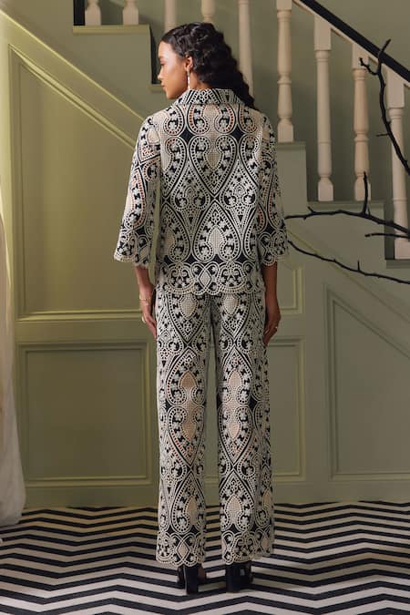 Shop Label Deepika Nagpal Black Viscose, Crepe Embroidery Collared Juju Floral Shirt And Pant Set at Aza Fashions Shop_Label Deepika Nagpal_Black Viscose, Crepe Embroidery Collared Juju Floral Shirt And Pant Set _at_Aza_Fashions