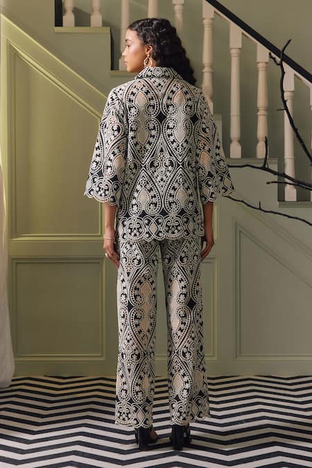Shop Label Deepika Nagpal Black Viscose, Crepe Embroidery Collared Jen Floral Cutwork Shirt And Pant Set at Aza Fashions Shop_Label Deepika Nagpal_Black Viscose, Crepe Embroidery Collared Jen Floral Cutwork Shirt And Pant Set _at_Aza_Fashions