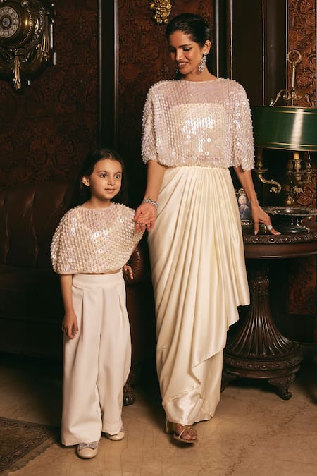 Studio22 By Pulkita Arora Bajaj Ivory Satin, Organza Crystals, Moonlight Embellished Cape Draped Skirt Set Online at Aza Fashions Studio22 By Pulkita Arora Bajaj_Ivory Satin, Organza Crystals, Moonlight Embellished Cape Draped Skirt Set _Online_at_Aza_Fashions