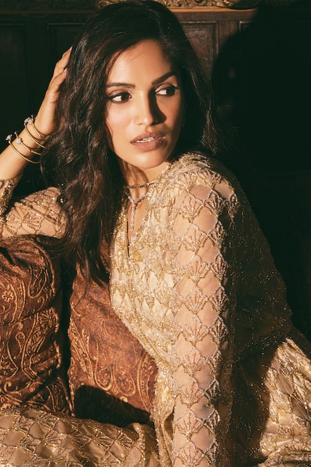 Shop_Studio22 By Pulkita Arora Bajaj_Gold Net Sequins, Beads Crystal Scallop Embroidered Peplum Kurta With Sharara _Online_at_Aza_Fashions