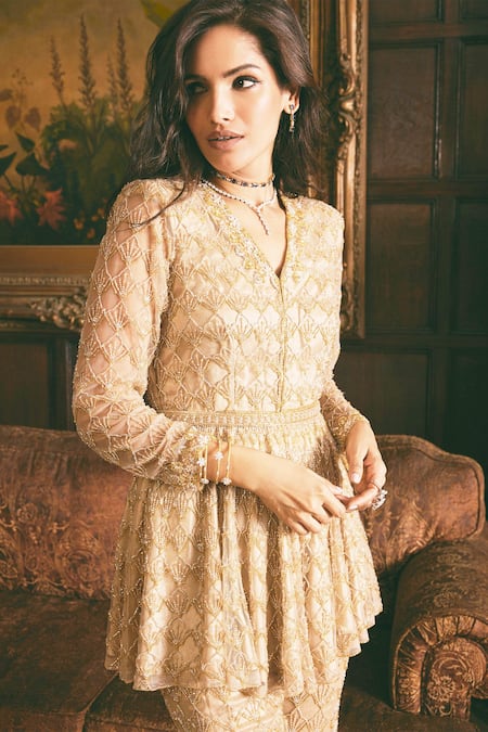 Studio22 By Pulkita Arora Bajaj_Gold Net Sequins, Beads Crystal Scallop Embroidered Peplum Kurta With Sharara _at_Aza_Fashions