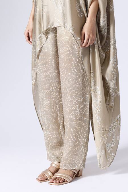 Klad Beige Satin Round Neck Lotus Print Poncho Top And Pant Set Online at Aza Fashions Klad_Beige Satin Round Neck Lotus Print Poncho Top And Pant Set_Online_at_Aza_Fashions