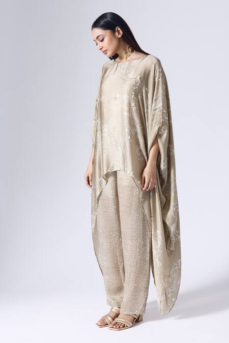 Buy Klad Beige Satin Round Neck Lotus Print Poncho Top And Pant Set Online at Aza Fashions Buy_Klad_Beige Satin Round Neck Lotus Print Poncho Top And Pant Set_Online_at_Aza_Fashions