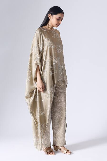Shop Klad Beige Satin Round Neck Lotus Print Poncho Top And Pant Set Online at Aza Fashions Shop_Klad_Beige Satin Round Neck Lotus Print Poncho Top And Pant Set_Online_at_Aza_Fashions