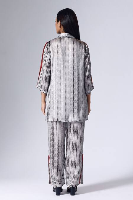 Shop_Klad_Black Satin Shibori Shawl Collar Pattern Jacket Pant Set_at_Aza_Fashions