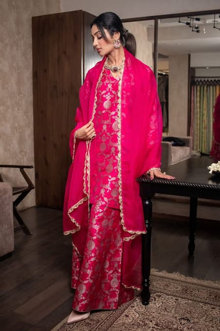 Shop Vishwa By Pinki Sinha Pink Silk Embroidery V-neck Woven Floral Banarasi Kurta Sharara Set at Aza Fashions Shop_Vishwa By Pinki Sinha_Pink Silk Embroidery V-neck Woven Floral Banarasi Kurta Sharara Set_at_Aza_Fashions