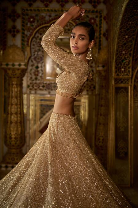 Seema Gujral_Gold Net Crystals, Sequins, Beads, Tassels Embroidered Bridal Lehenga Set _Online_at_Aza_Fashions