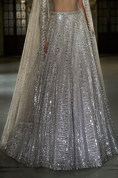 Shop_Seema Gujral_Silver Net Mirrors, Sequins Plunge Neck Embroidered Lehenga Set _Online_at_Aza_Fashions
